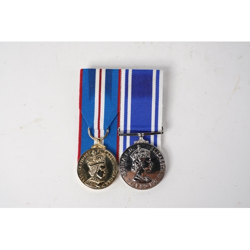 593 - A Queen Elizabeth II Diamond Jubilee medal & Police Long Service and Good Conduct Medal.