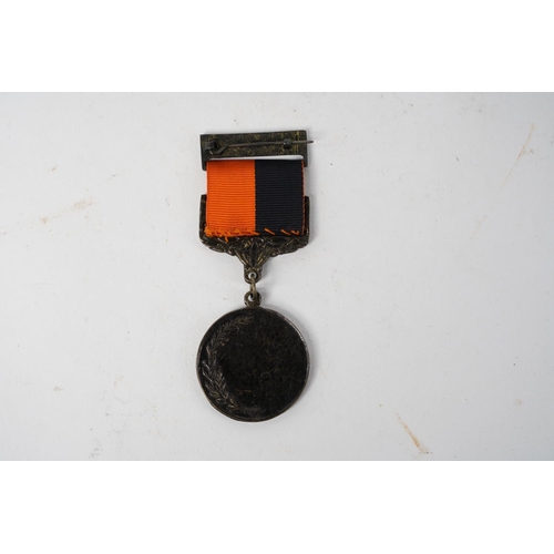 655 - An Irish War of Independence 'Black & Tans' Volunteer Medal with Comrac bar.