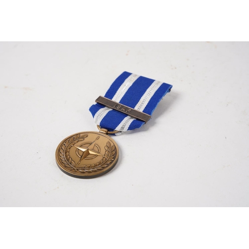 664 - A NATO 'In Service of Peace & Freedom' Medal.