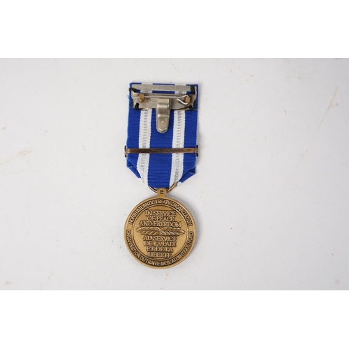 664 - A NATO 'In Service of Peace & Freedom' Medal.