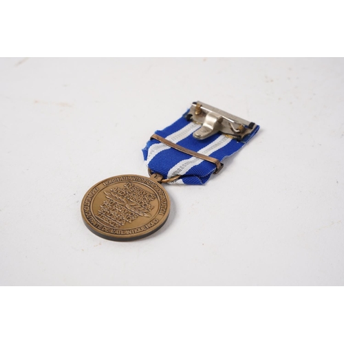 664 - A NATO 'In Service of Peace & Freedom' Medal.