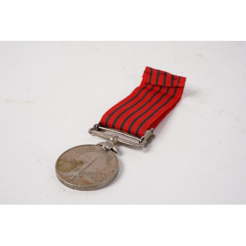 671 - An Indian General Service Naga Hills Medal.