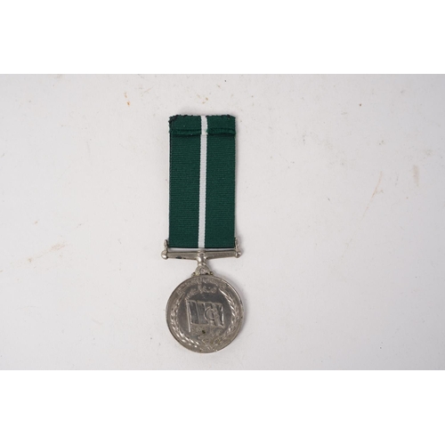 673 - A Pakistan Independence Medal, awarded to Mehr Din F/C 768.