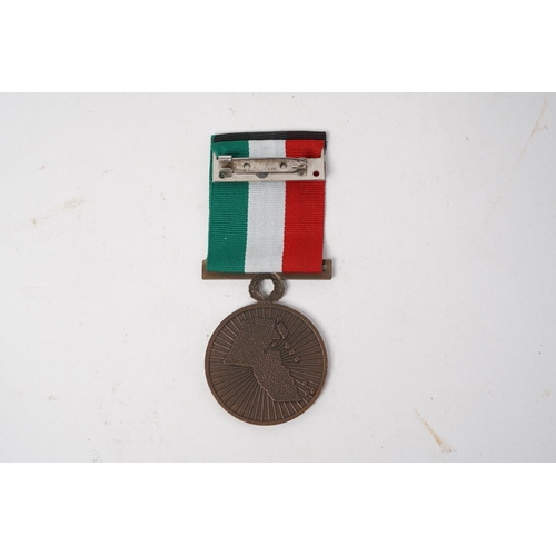 679 - A Kuwait Liberation Medal.