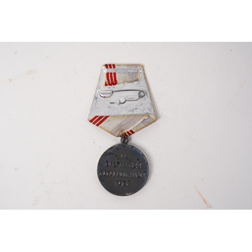 684 - A Russian/ USSR Veteran of Labour Medal.