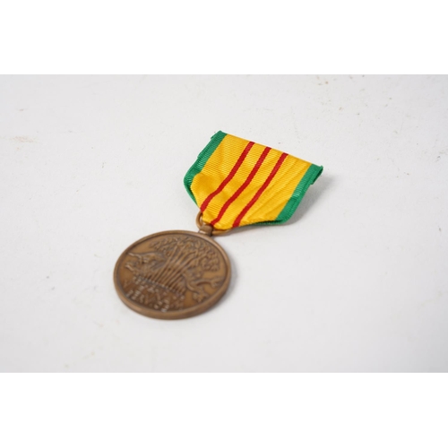 688 - A United States of America Vietnam Service Medal.