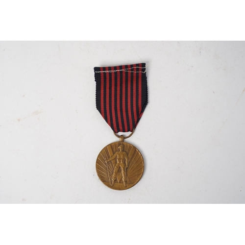 695 - A Belgian WW2 Volunteer Medal.