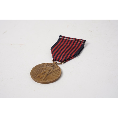 695 - A Belgian WW2 Volunteer Medal.