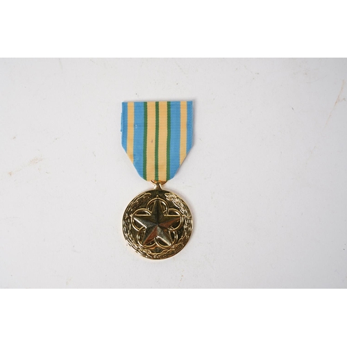 709 - A USA Outstanding Volunteer Service Medal.