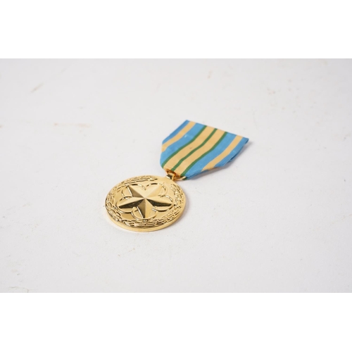 709 - A USA Outstanding Volunteer Service Medal.