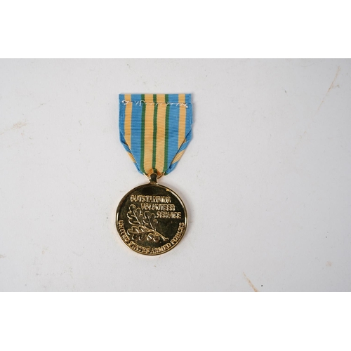 709 - A USA Outstanding Volunteer Service Medal.