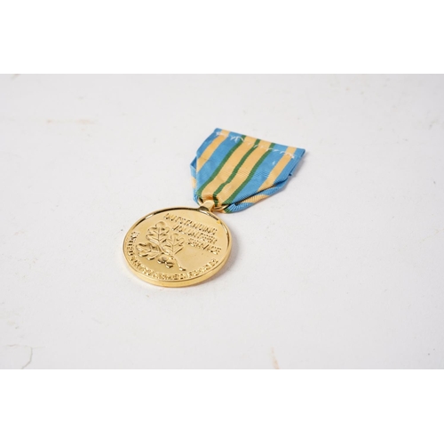 709 - A USA Outstanding Volunteer Service Medal.