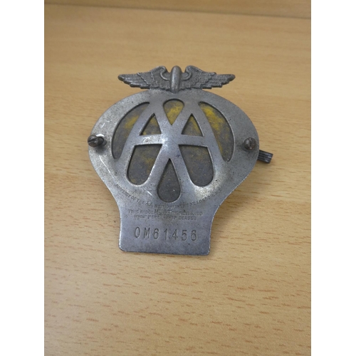 12 - A vintage AA car badge.