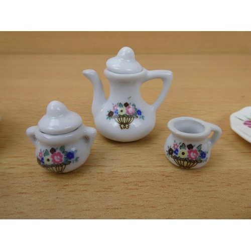 19 - A collection of miniature doll's china.