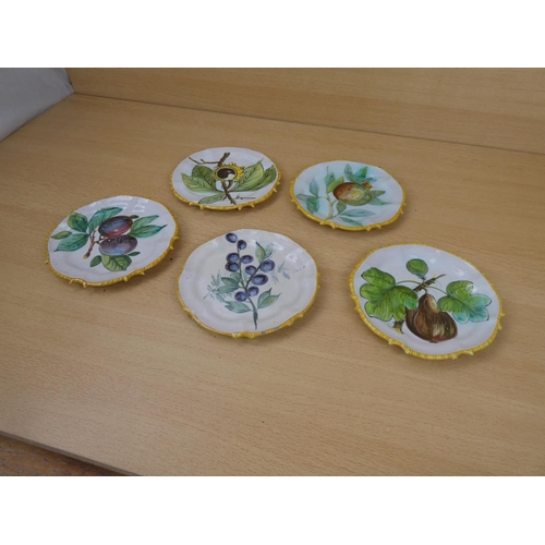 2 - A set of five hand painted fruit patterned plates.