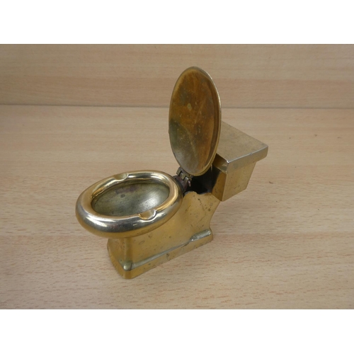 27 - A novelty brass 'toliet ashtray.