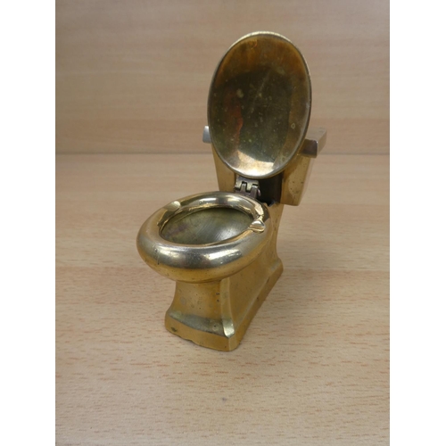 27 - A novelty brass 'toliet ashtray.