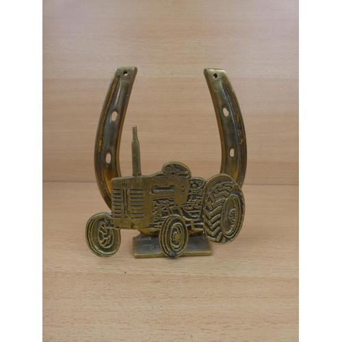 34 - A large brass horseshoe and tractor letter holder.