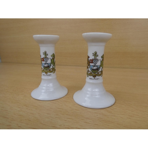 4 - A pair of Goss china candlesticks with the Belfast crest.