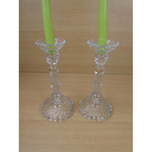 47 - A stunning pair of vintage pressed glass candlesticks and candles.