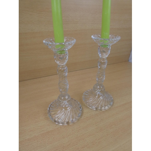 47 - A stunning pair of vintage pressed glass candlesticks and candles.