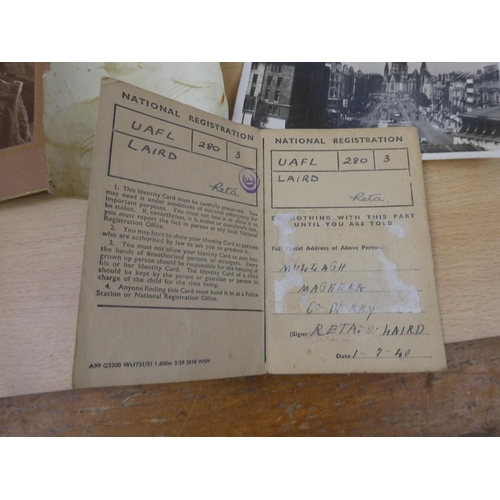 53 - An interesting lot of vintage photograph albums, postcards and a National Registration Identity Card... 