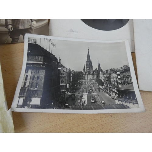 53 - An interesting lot of vintage photograph albums, postcards and a National Registration Identity Card... 