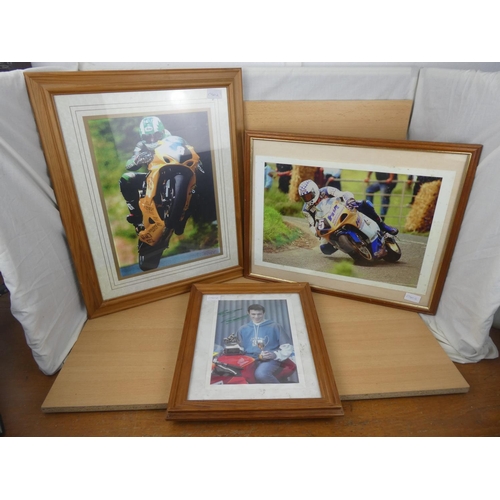 75 - Three framed motorbike racing pictures.