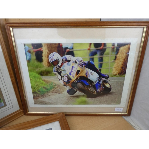 75 - Three framed motorbike racing pictures.