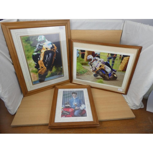 75 - Three framed motorbike racing pictures.