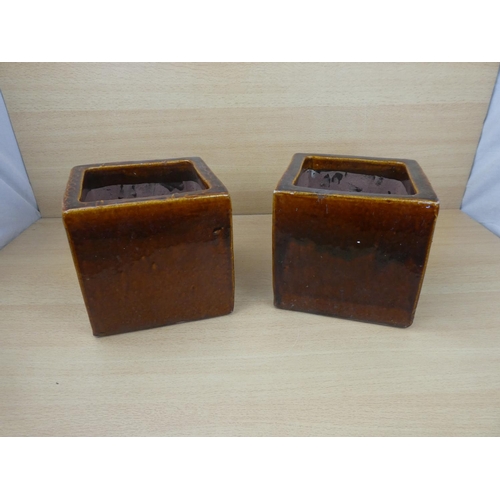 82 - A pair of glazed planters.