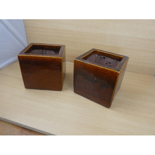 82 - A pair of glazed planters.