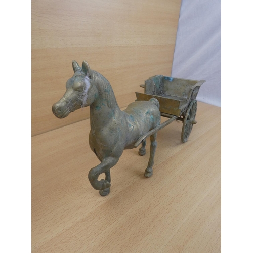 87 - A vintage brass horse and cart.