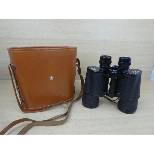 89 - A pair of vintage leather cased Zenith 10 x 50 binoculars.