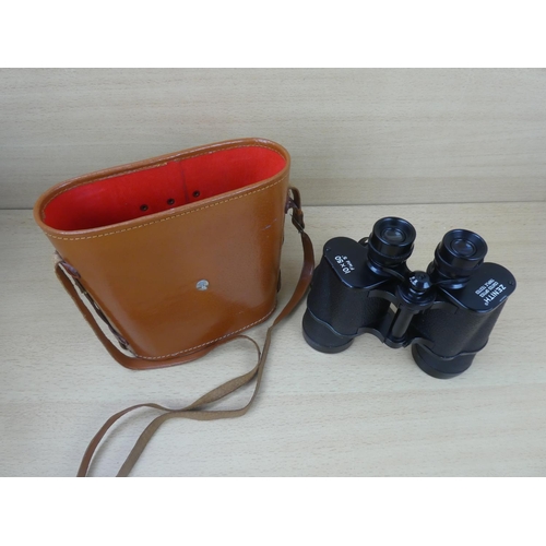 89 - A pair of vintage leather cased Zenith 10 x 50 binoculars.