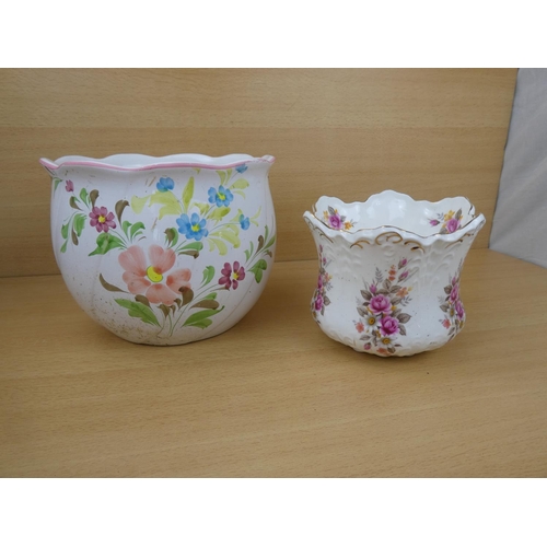 9 - Two ceramic floral planters.