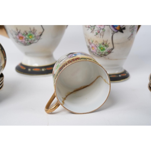 19 - An Oriental patterned coffee set with repairs to the milk jug.