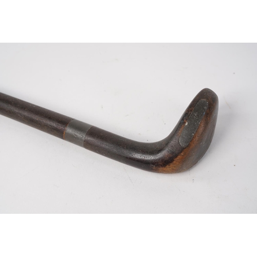 92 - An antique walking cane/Sunday stick golf club.