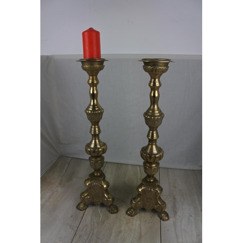 142 - A large pair of antique style ecclesiastical candlesticks, Each Approx 58cm in height.