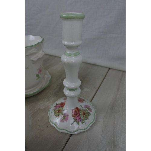 408 - A stunning pair of floral patterned candlesticks by Royal Winton, a matching shoe ornament and vase ... 