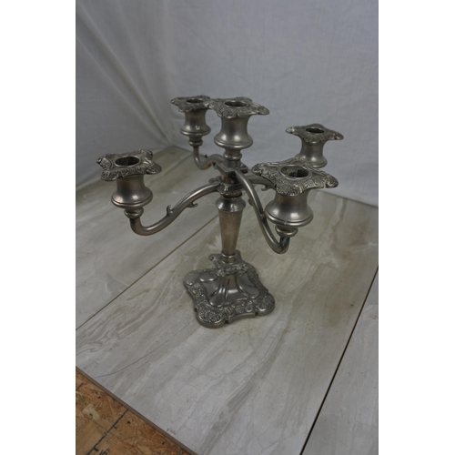 430 - A five branch silver plated candelabra.