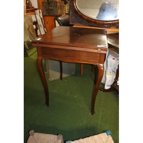 492 - An antique mahogany envelope card table, measuring 54cm x 54cm x 75cm.