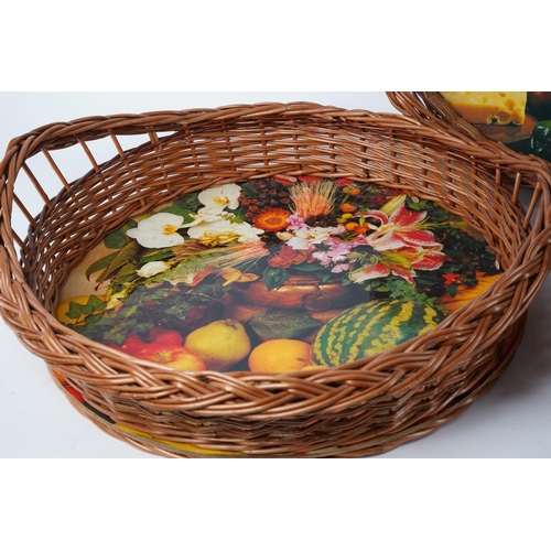 509 - A set of three vintage wicker tray baskets.