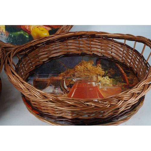 509 - A set of three vintage wicker tray baskets.