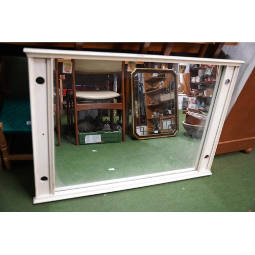 533 - A large overmantle mirror, 104cm x 70cm.