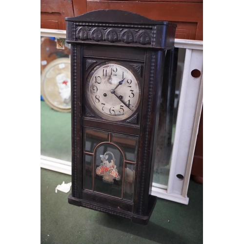 570 - A stunning antique German box clock with a floral panel.