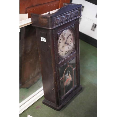 570 - A stunning antique German box clock with a floral panel.