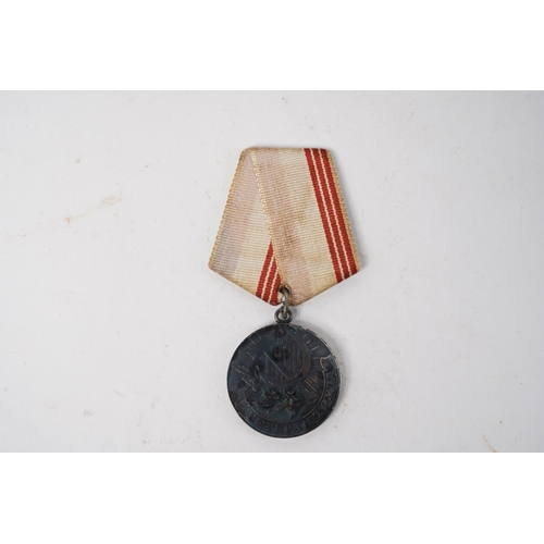 684 - A Russian/ USSR Veteran of Labour Medal.