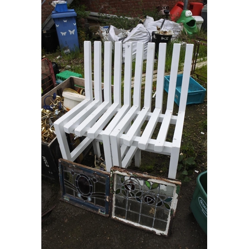 734 - A pair of painted wooden garden chairs.