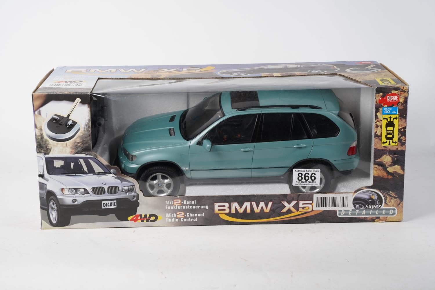 A large boxed remote control BMW X5.